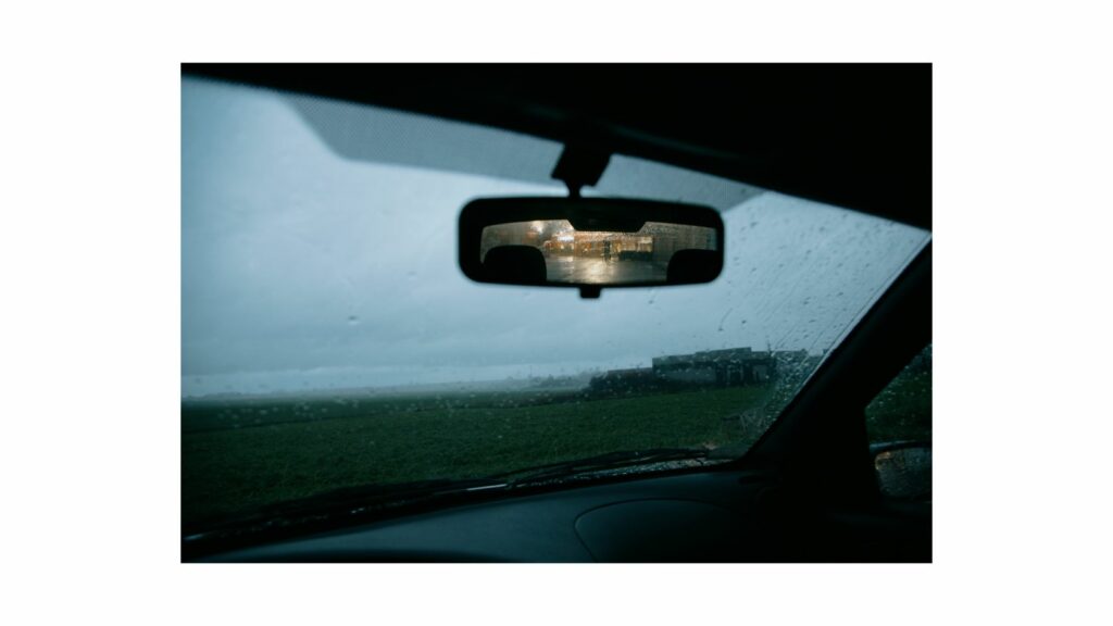 Rear View Mirror Reflecting Headlights