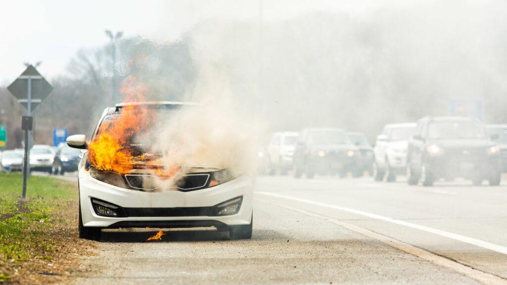 Car on Fire in the Middle of Traffic