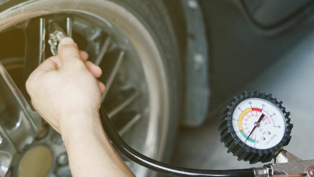 Checking Tire Pressure With a Gauge