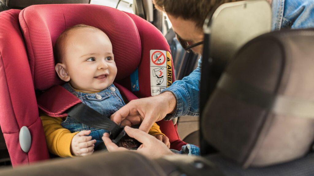 Making a Baby Sit on a Baby Car Seat