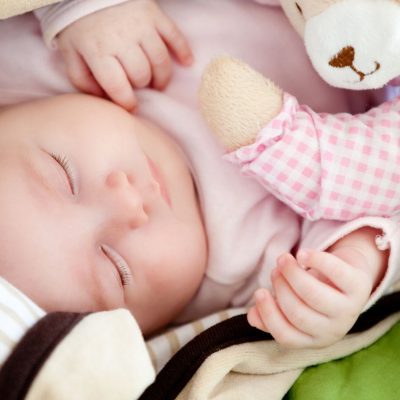 Baby Sleeping On a Blanket