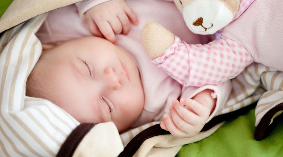 Baby Sleeping On a Blanket