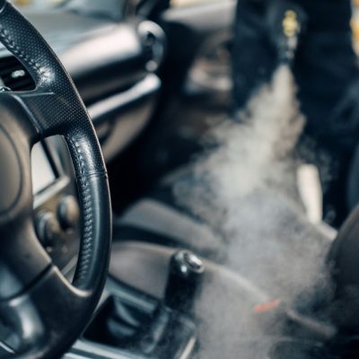 Blowing Car Interior With A Vacuum