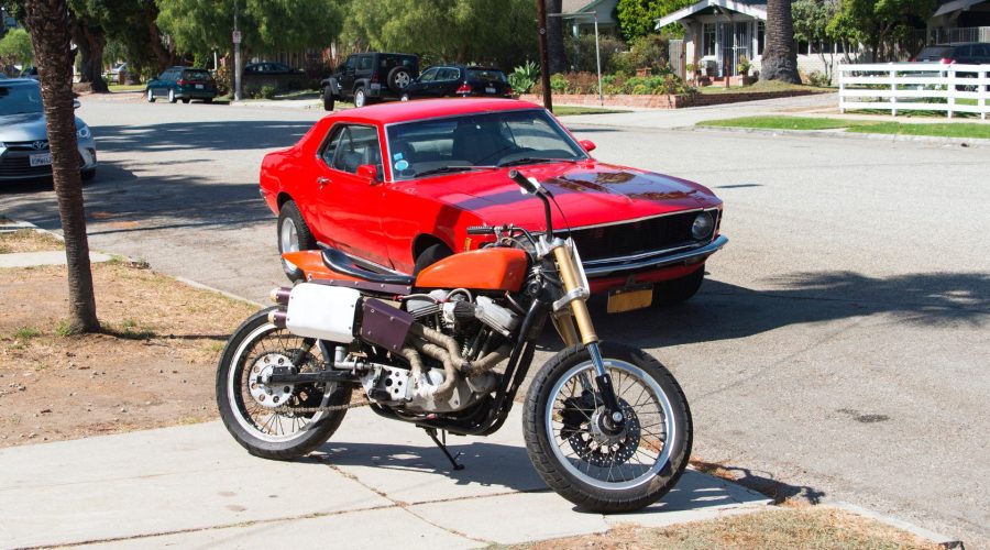 Car and Motorcycle Standing Together