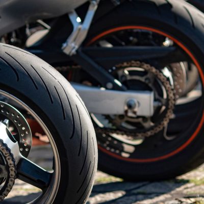 Motorcycle tire treads opposite direction