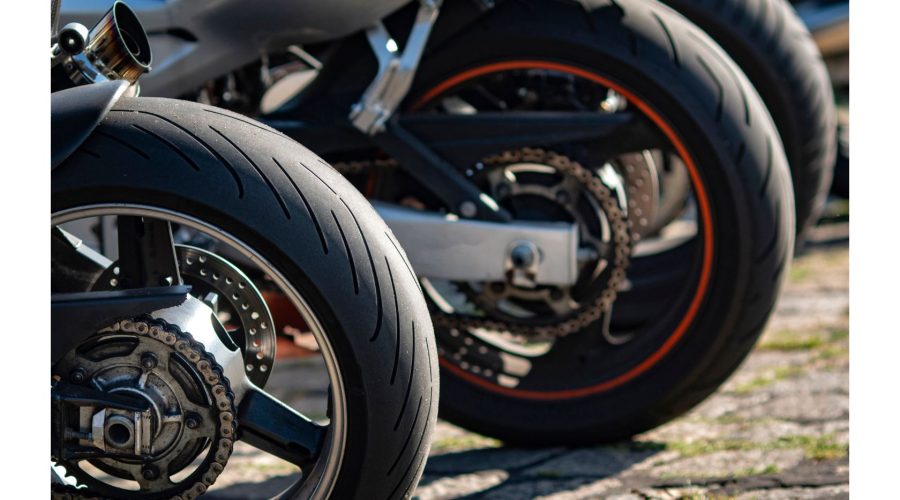 Motorcycle tire treads opposite direction