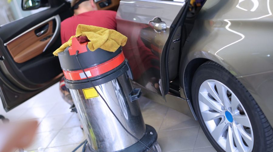 Vacuum Cleaner Near Car Door