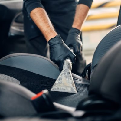 Vacuuming Car Interiors